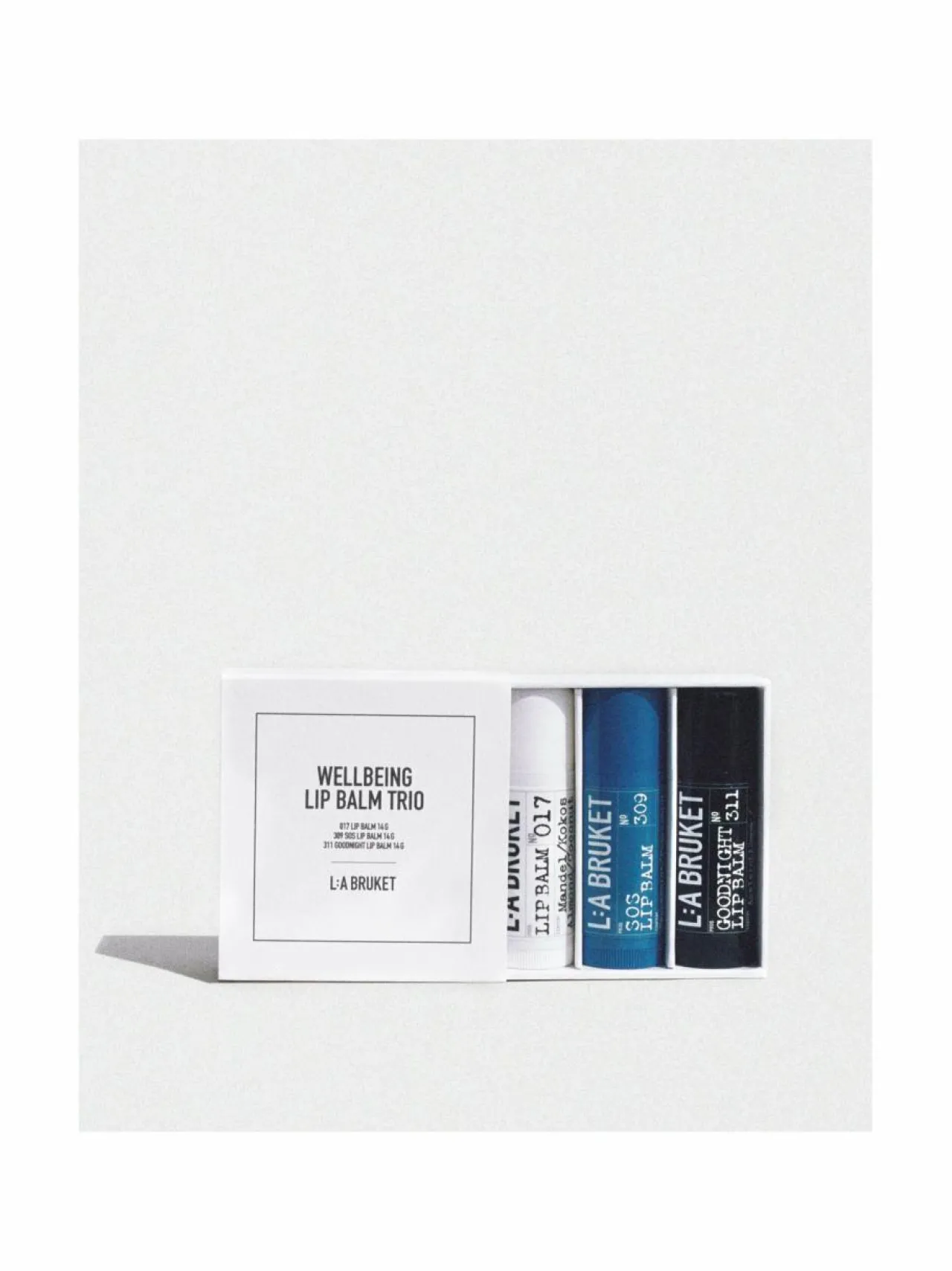 Lahjapakkaukset|Ihonhoitopakkaukset-L:A Bruket Wellbeing Lip Balm Trio -huulivoidepakkaus, 3x14g