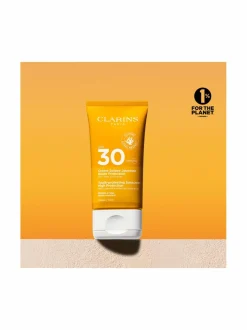 Aurinkotuotteet-Clarins Youth-protecting Sunscreen SPF 30 for face -aurinkosuojavoide